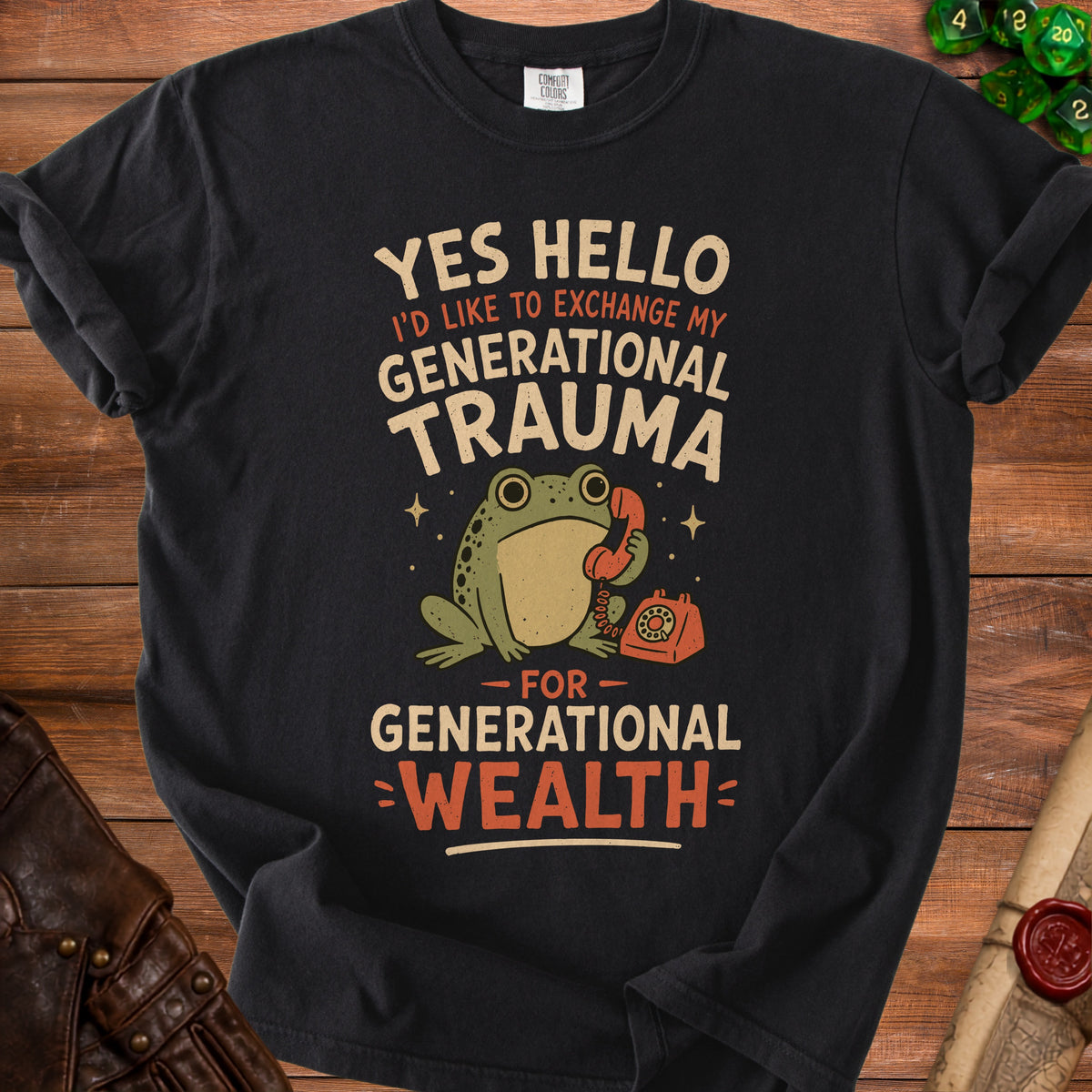 Black t-shirt with frog on phone graphic and text "Generational Trauma for Generational Wealth".