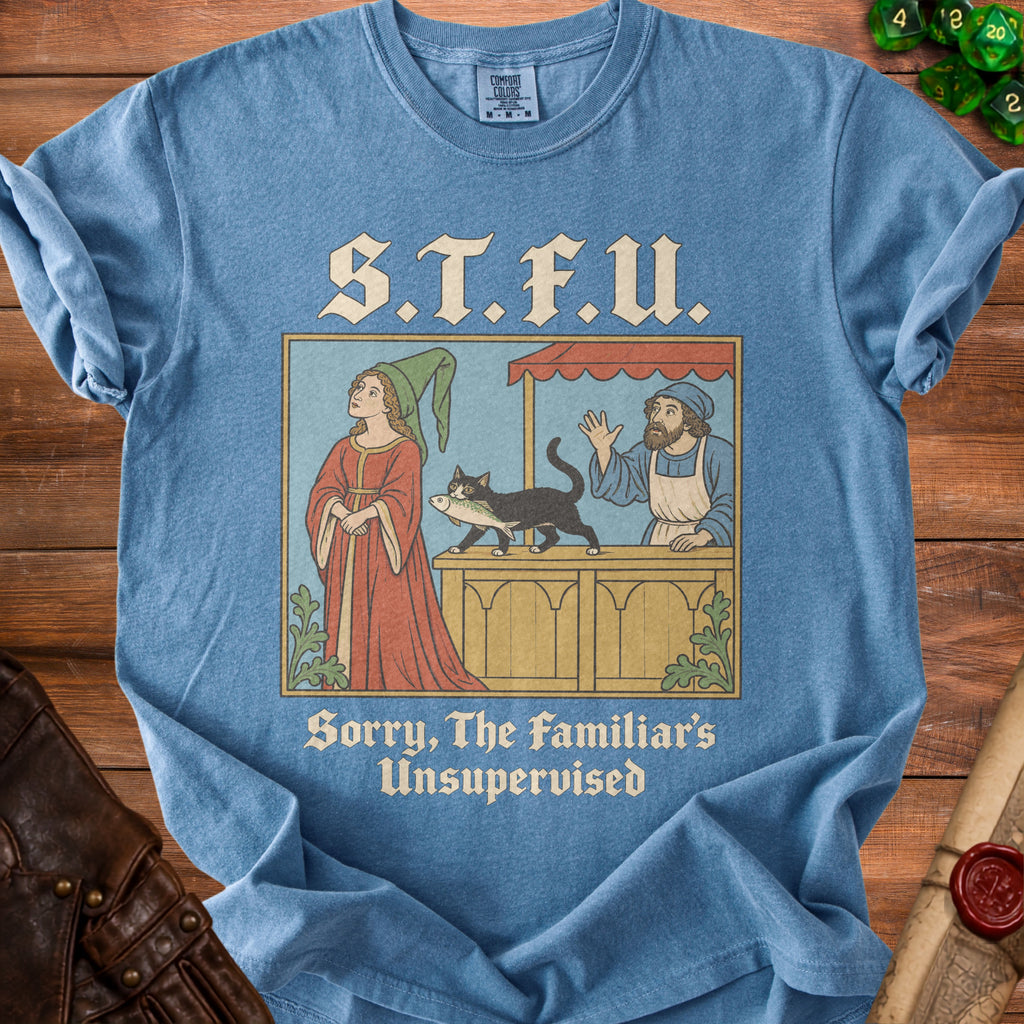 Blue t-shirt with "S.T.F.U. Sorry, The Familiar's Unsupervised" and medieval illustration.