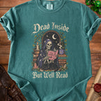 Green t-shirt with skeleton reading a book and black cat. Text reads "Dead Inside But Well Read".