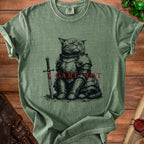 Green t-shirt with a knight cat illustration and the text "I CARE NOT".