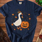 Navy t-shirt with Halloween goose, pumpkin, crescent moon, and floral art.