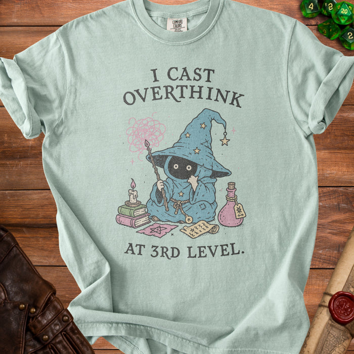 T-shirt with "I CAST OVERTHINK AT 3RD LEVEL" text and wizard graphic.