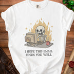 White t-shirt with skeleton at computer surrounded by flames, text reads "I HOPE THIS EMAIL FINDS YOU WELL".