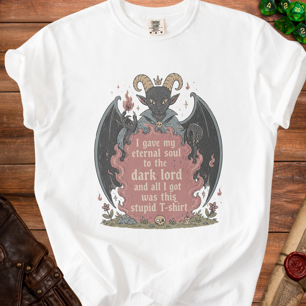 White t-shirt with a demon graphic and text "I gave my eternal soul to the dark lord and all I got was this stupid T-shirt".