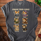 T-shirt with "Choose Your Corgi" text and six corgi characters dressed as fantasy roles.