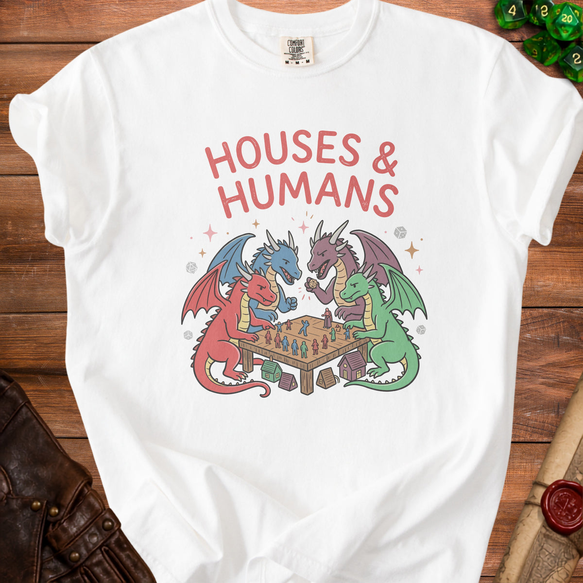 White t-shirt with "HOUSES & HUMANS" and dragons playing a board game.