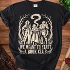 Black t-shirt with "We Meant To Start A Book Club" text and fantasy characters.