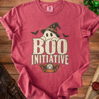 Red t-shirt with ghost wearing witch hat, text "BOO INITIATIVE", and D20 dice.