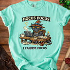 Aqua t-shirt with "Hocus Pocus" and a frustrated witch cat with a laptop, "I Cannot Focus".