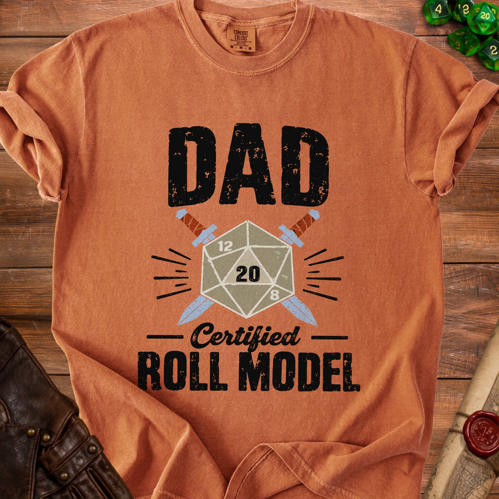 Orange t-shirt with "DAD Certified ROLL MODEL" text and dice imagery.
