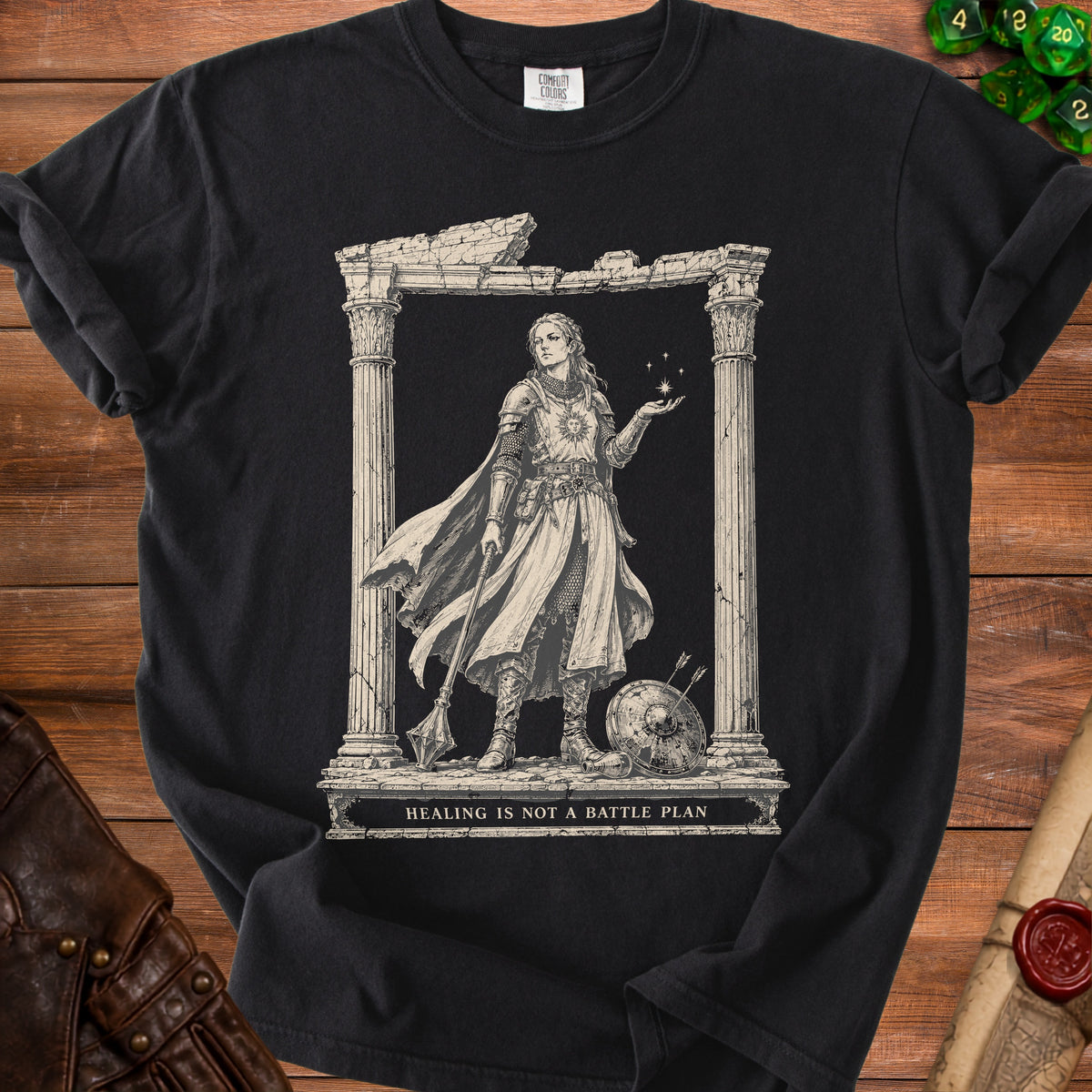 Black t-shirt with medieval warrior art and the text "HEALING IS NOT A BATTLE PLAN".