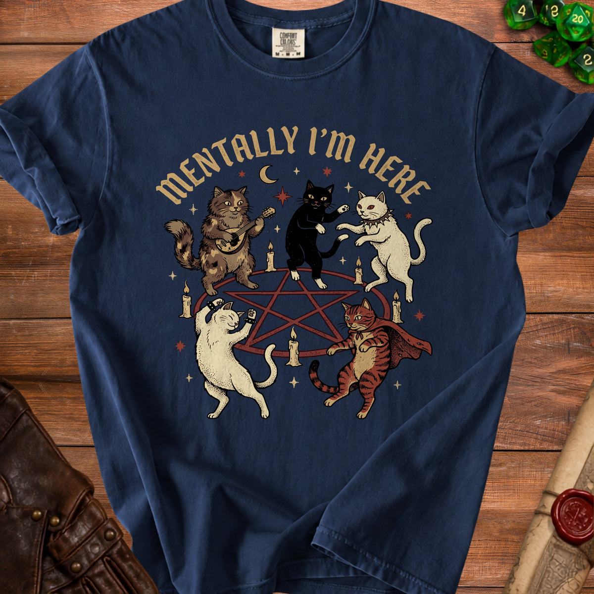 Navy t-shirt with five cats dancing around a pentagram, text reads "MENTALLY I'M HERE".