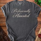 Dark grey t-shirt with "Professionally Haunted" text.