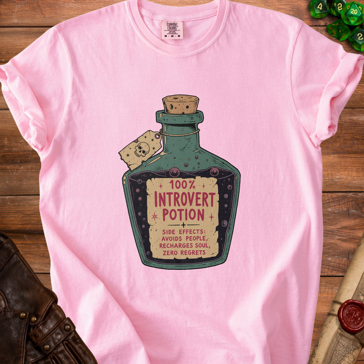Pink t-shirt with "100% Introvert Potion" graphic and side effects.