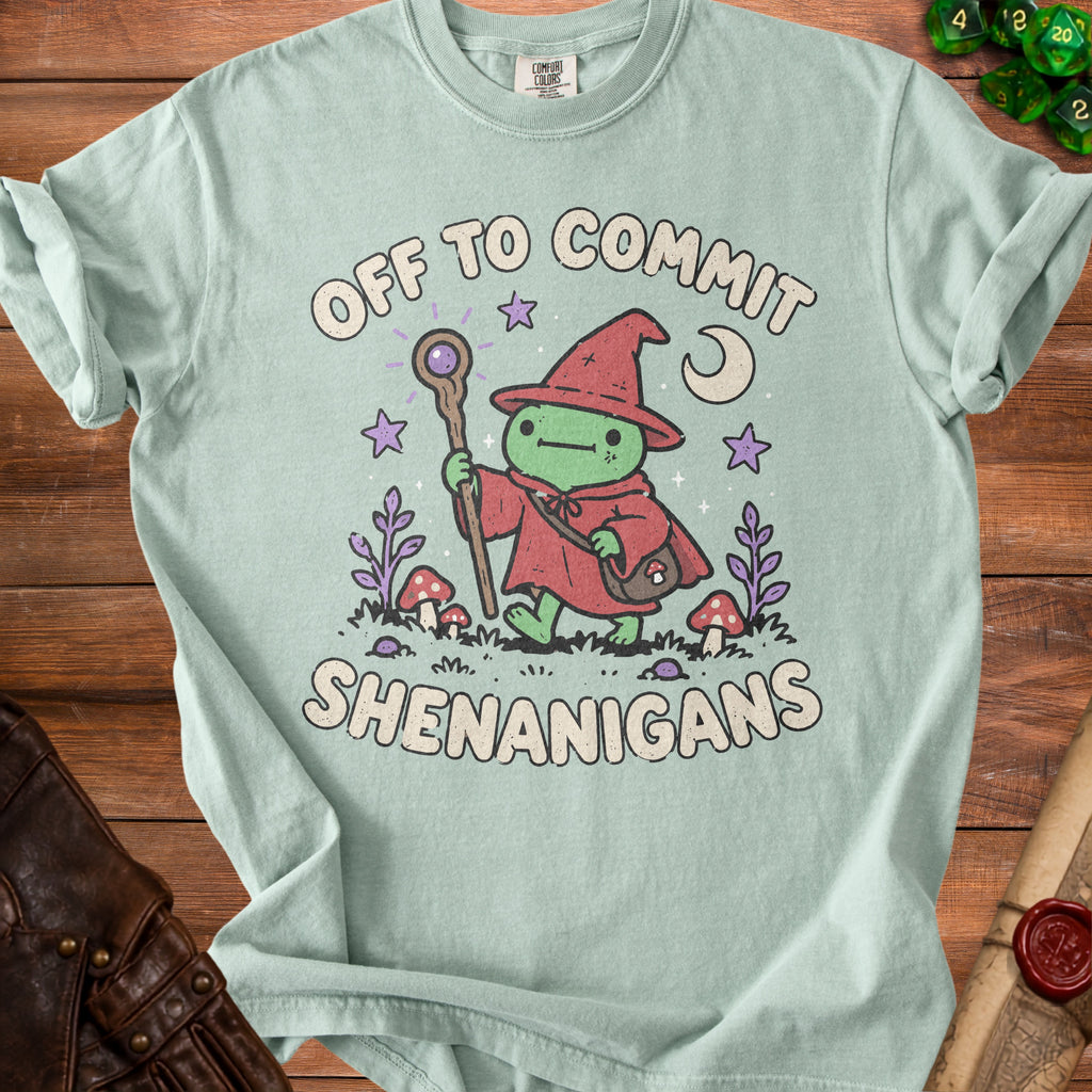 Light blue t-shirt with wizard frog graphic and text "Off to Commit Shenanigans".