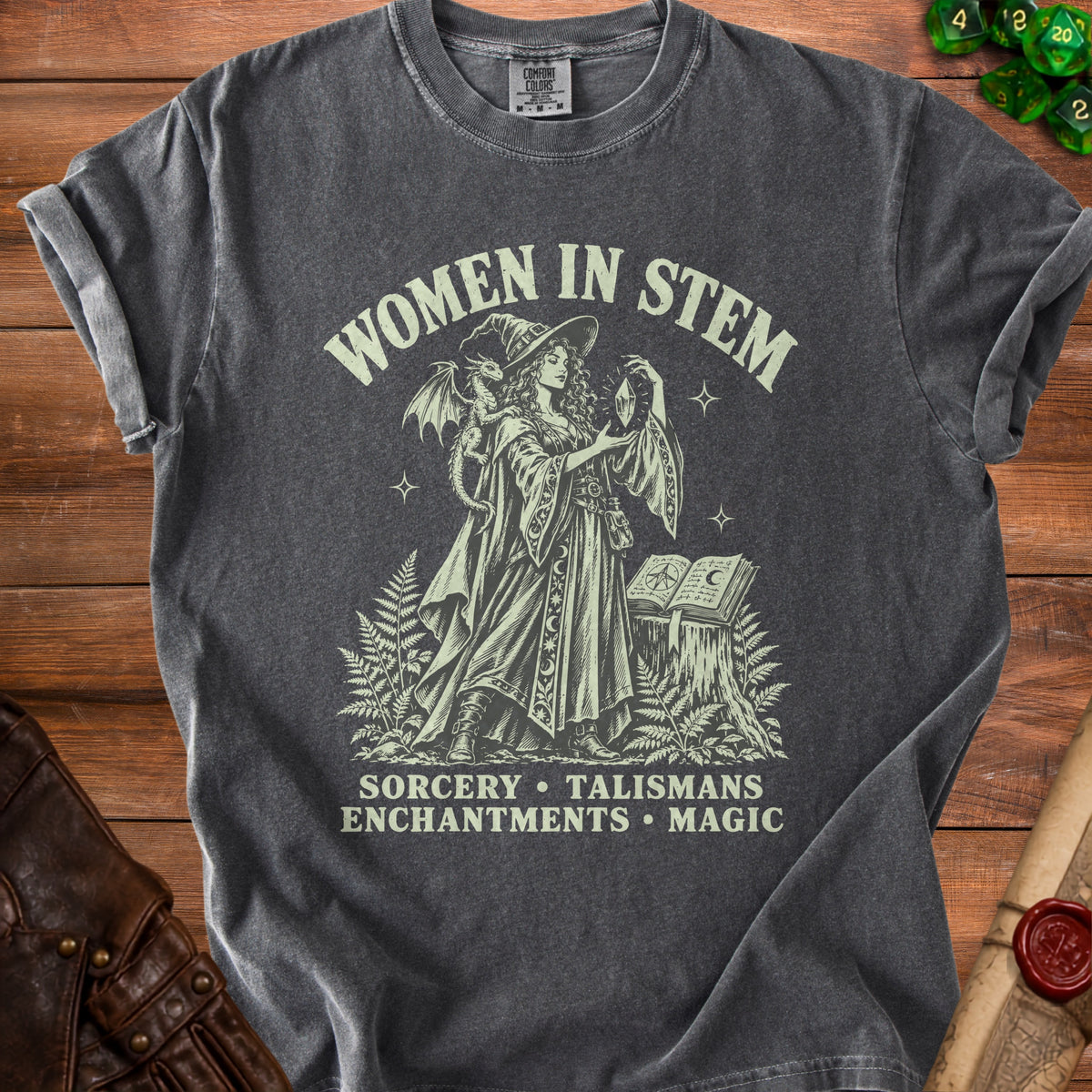 Women in STEM t-shirt with witch, dragon, crystals, and magic book graphic.