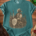 Armored duck with sword, shield displaying "20" and halo, in reeds.