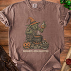 Goblin witch brews potion by cauldron, with pumpkin and book. "Probably a Healing Potion" text.