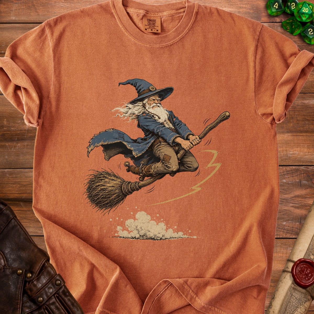 T-shirt with a wizard flying on a broomstick, printed design.