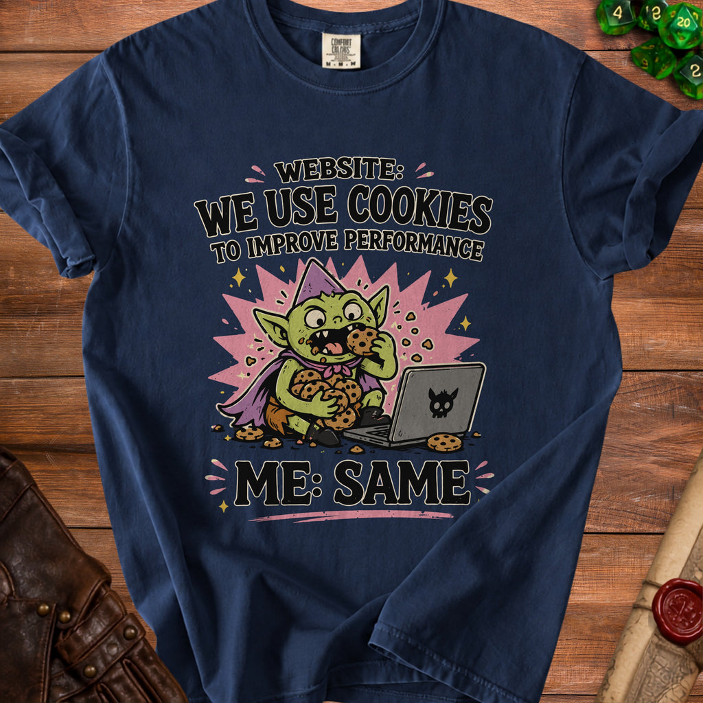 Goblin eating cookies from laptop with text "Website: We use cookies to improve performance. Me: Same."