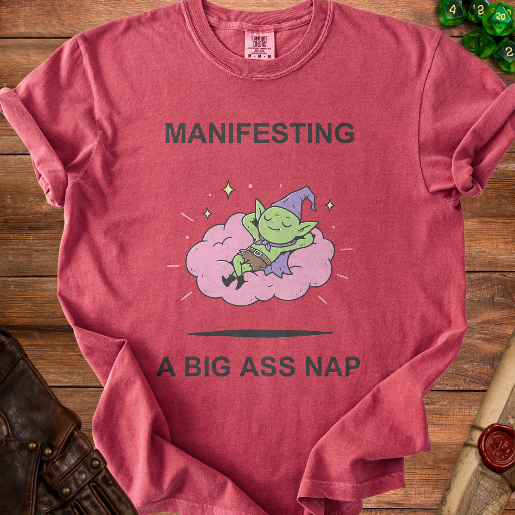 T-shirt with "MANIFESTING A BIG ASS NAP" text and goblin character.