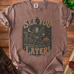 Brown t-shirt with "See You Later!" graphic featuring Grim Reaper in a boat.
