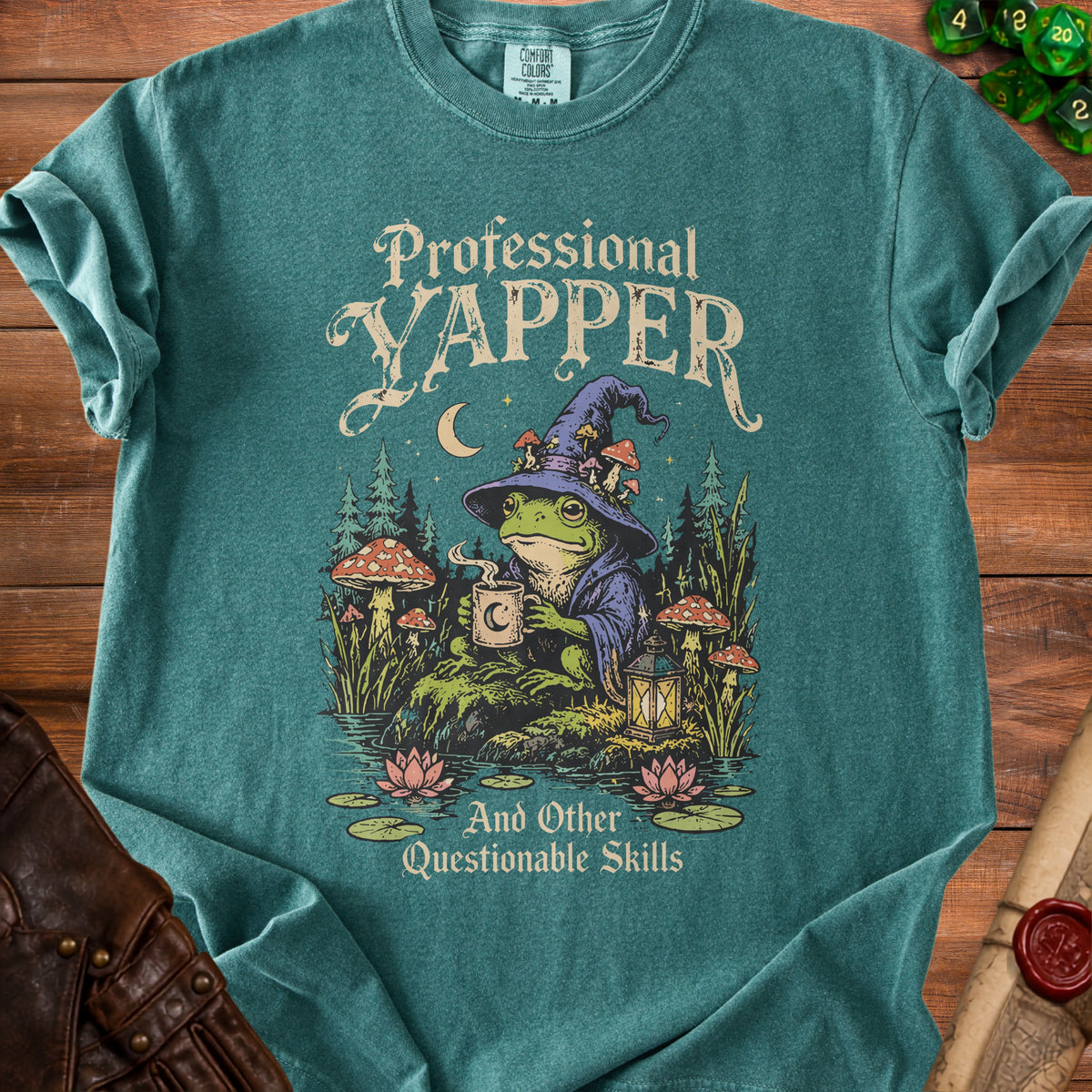 Green t-shirt with "Professional Yapper And Other Questionable Skills" text and frog graphic.