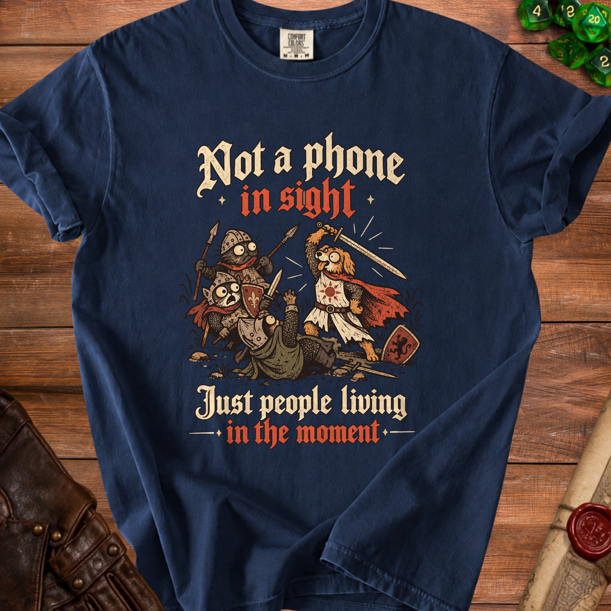 Navy t-shirt with "Not a phone in sight, Just people living in the moment" text and knights.