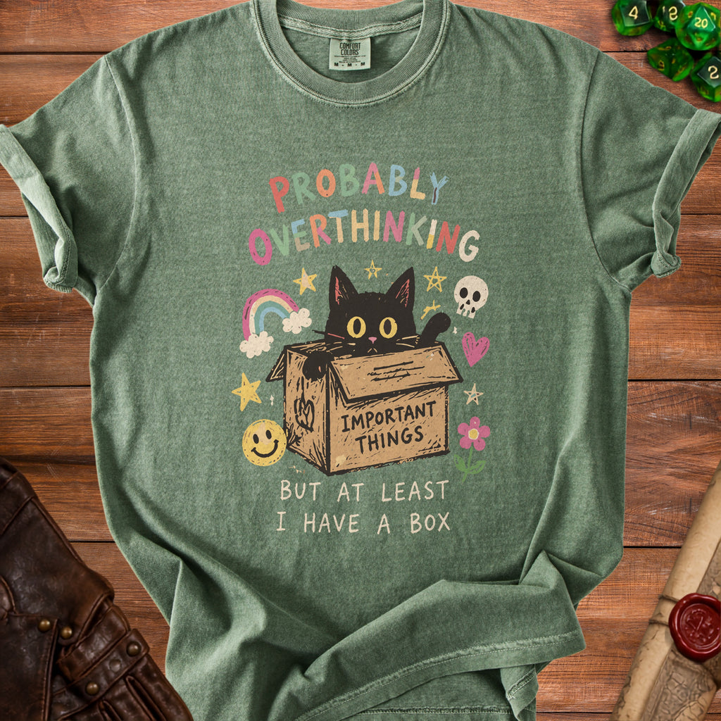 Green t-shirt with black cat in a box and "Probably Overthinking" text.