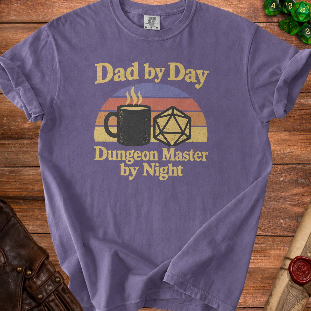 Purple t-shirt with "Dad by Day Dungeon Master by Night" text, coffee cup, and D20 die.