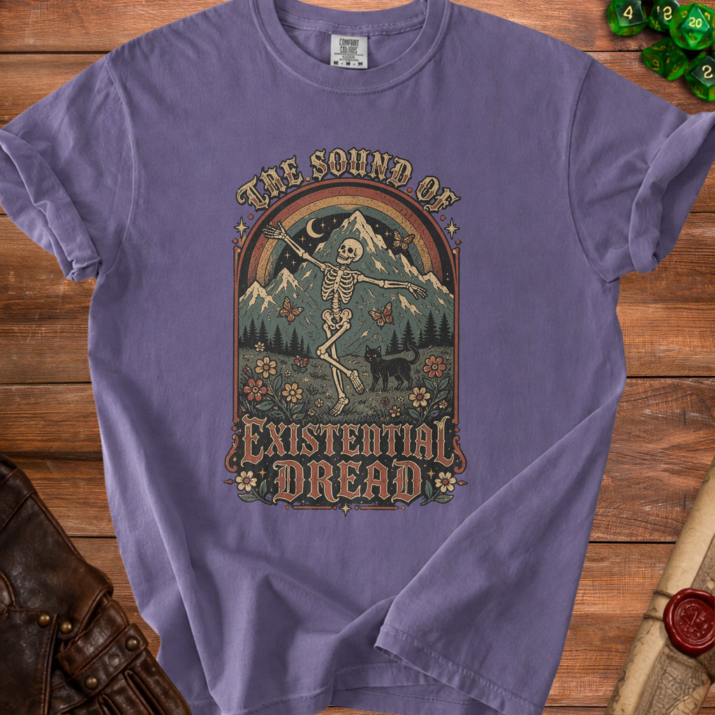 Purple t-shirt with skeleton dancing under a rainbow, mountains, and text "The Sound of Existential Dread".