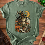 Frog wizard with pumpkin, moon, and ghost on green t-shirt.
