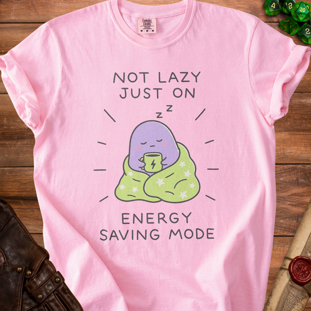 Pink t-shirt with graphic saying "NOT LAZY JUST ON ENERGY SAVING MODE"