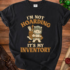 Black t-shirt with cartoon cat in armor and text "I'm Not Hoarding It's My Inventory".