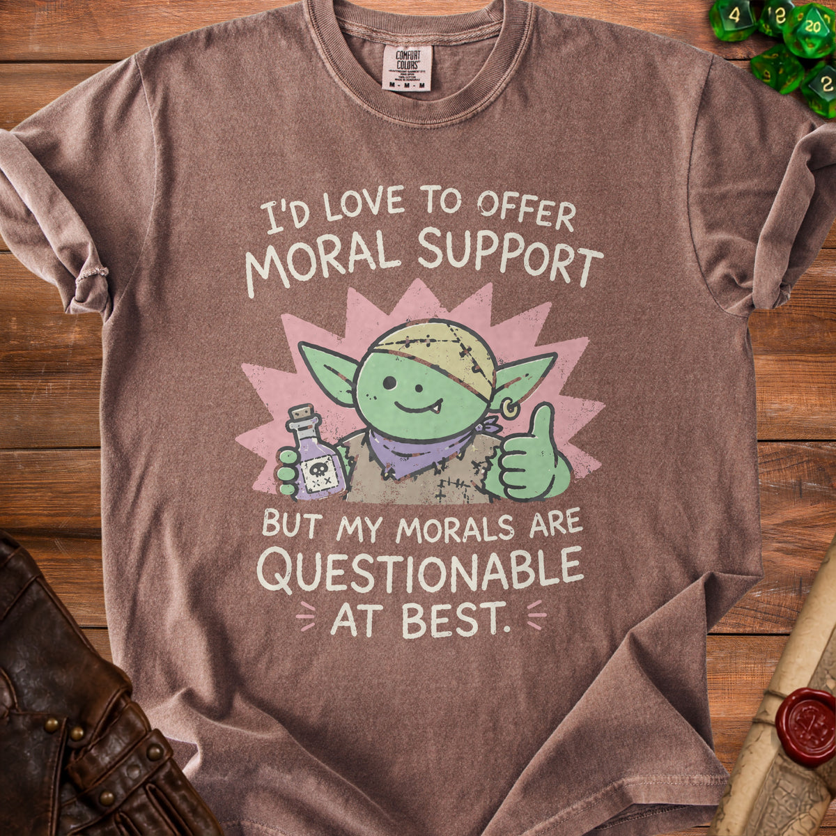 T-shirt with a green goblin holding a bottle, giving a thumbs-up. Text reads "I'd love to offer moral support but my morals are questionable at best."