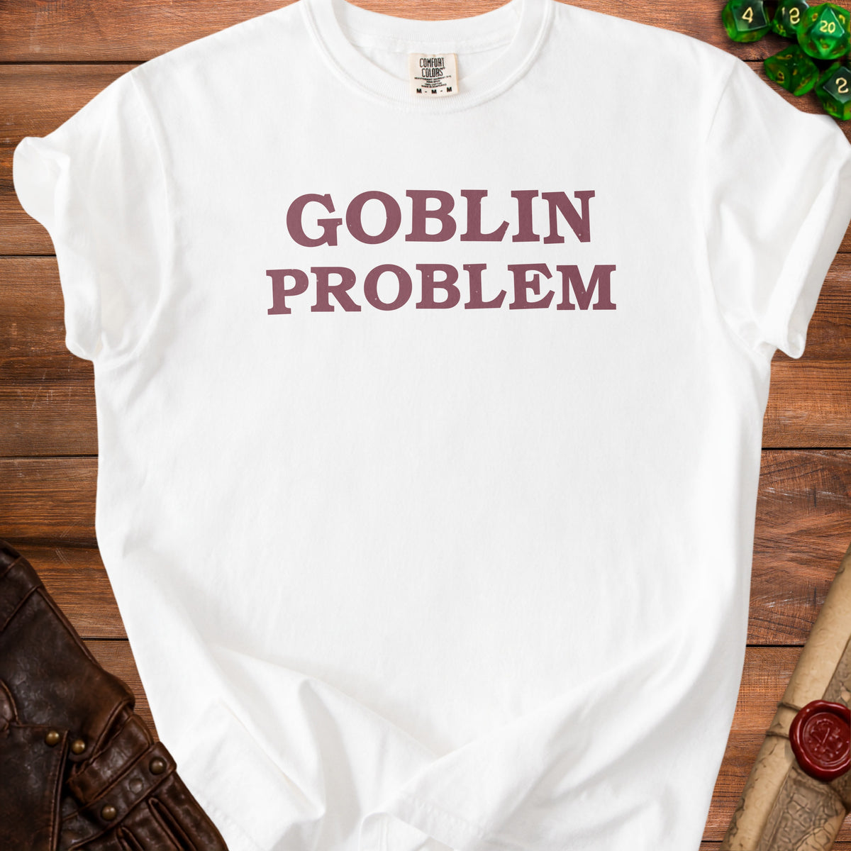 White t-shirt with "GOBLIN PROBLEM" text and Comfort Colors tag.