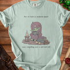 Light blue t-shirt with wizard holding a "HELP" mug and text: "cause everything sure is mid and evil".