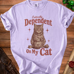 Light purple t-shirt with "Critically Dependent On My Cat" text and cat illustration.