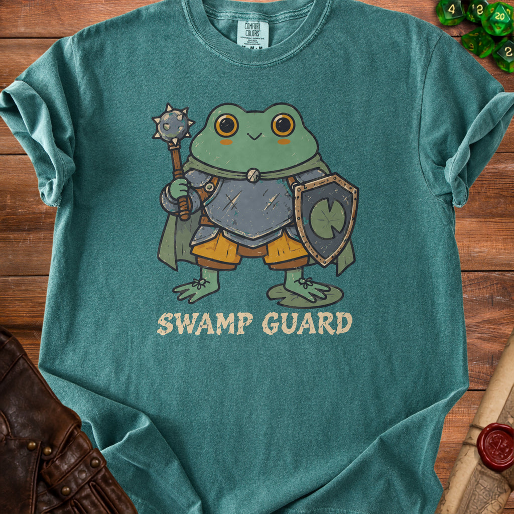 Green t-shirt with cartoon frog knight and text "SWAMP GUARD".