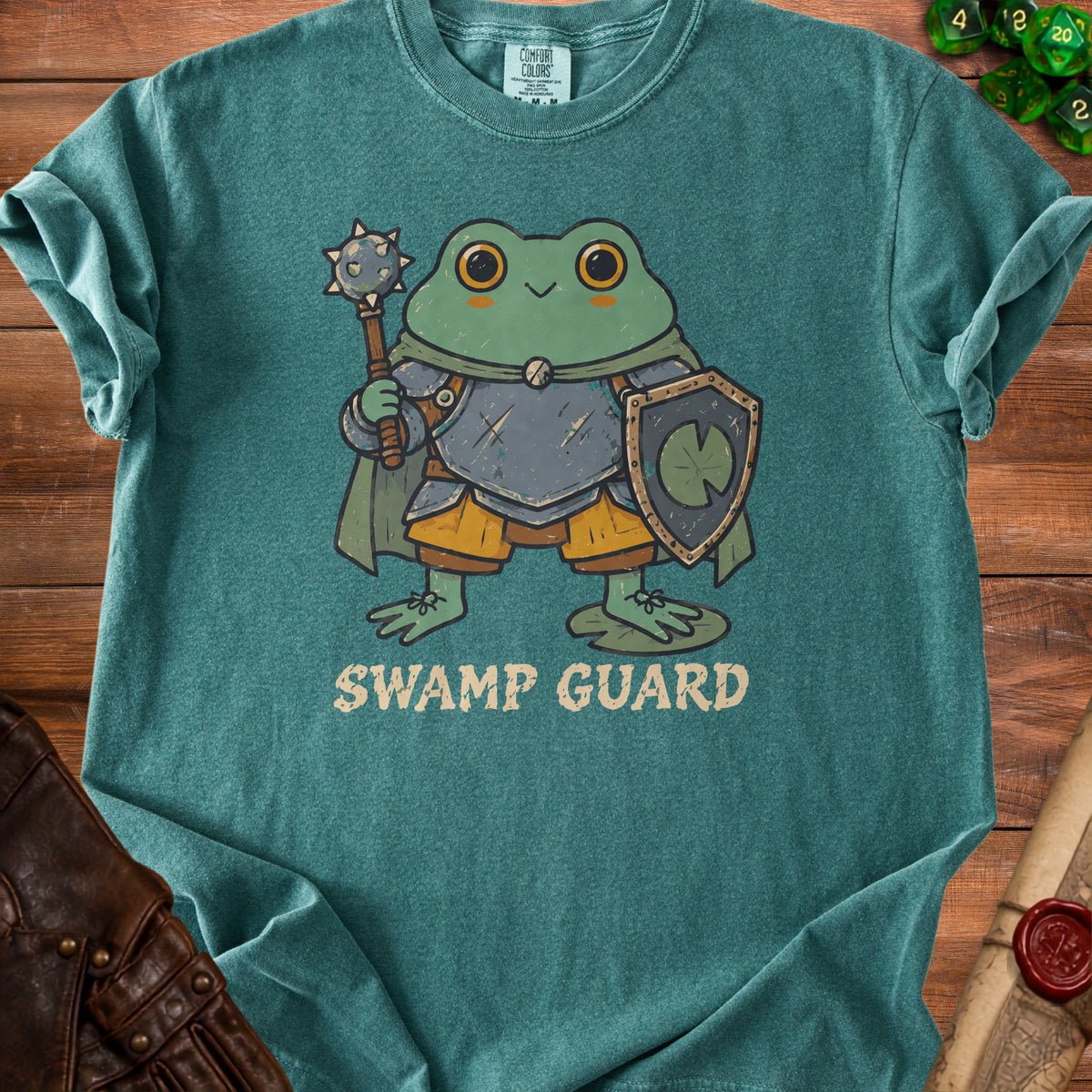 Green t-shirt with cartoon frog knight and text "SWAMP GUARD".