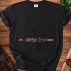 Black t-shirt with knight on a cat and text "WE RIDE AT NOON".