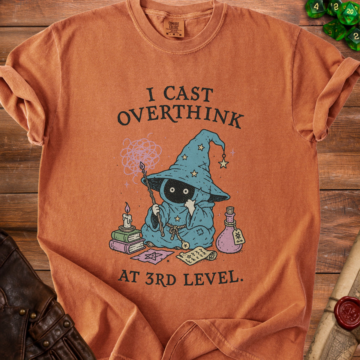 Orange t-shirt with wizard character and text "I CAST OVERTHINK AT 3RD LEVEL."