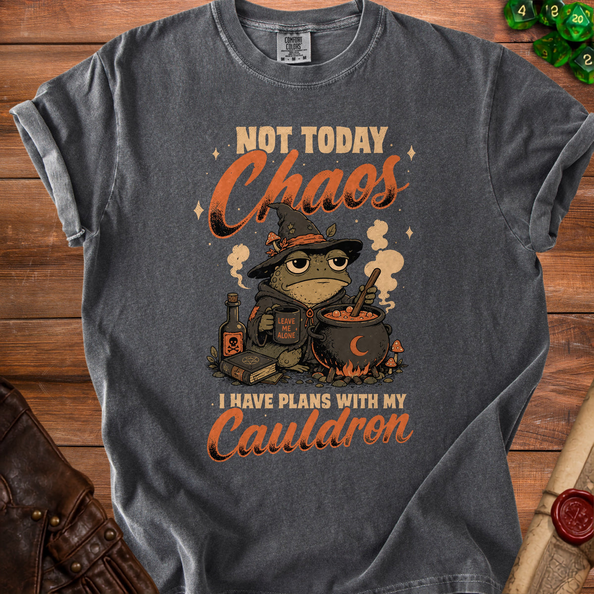 T-shirt graphic: Frog wizard with cauldron, text "Not Today Chaos", "Leave Me Alone", "I Have Plans With My Cauldron".