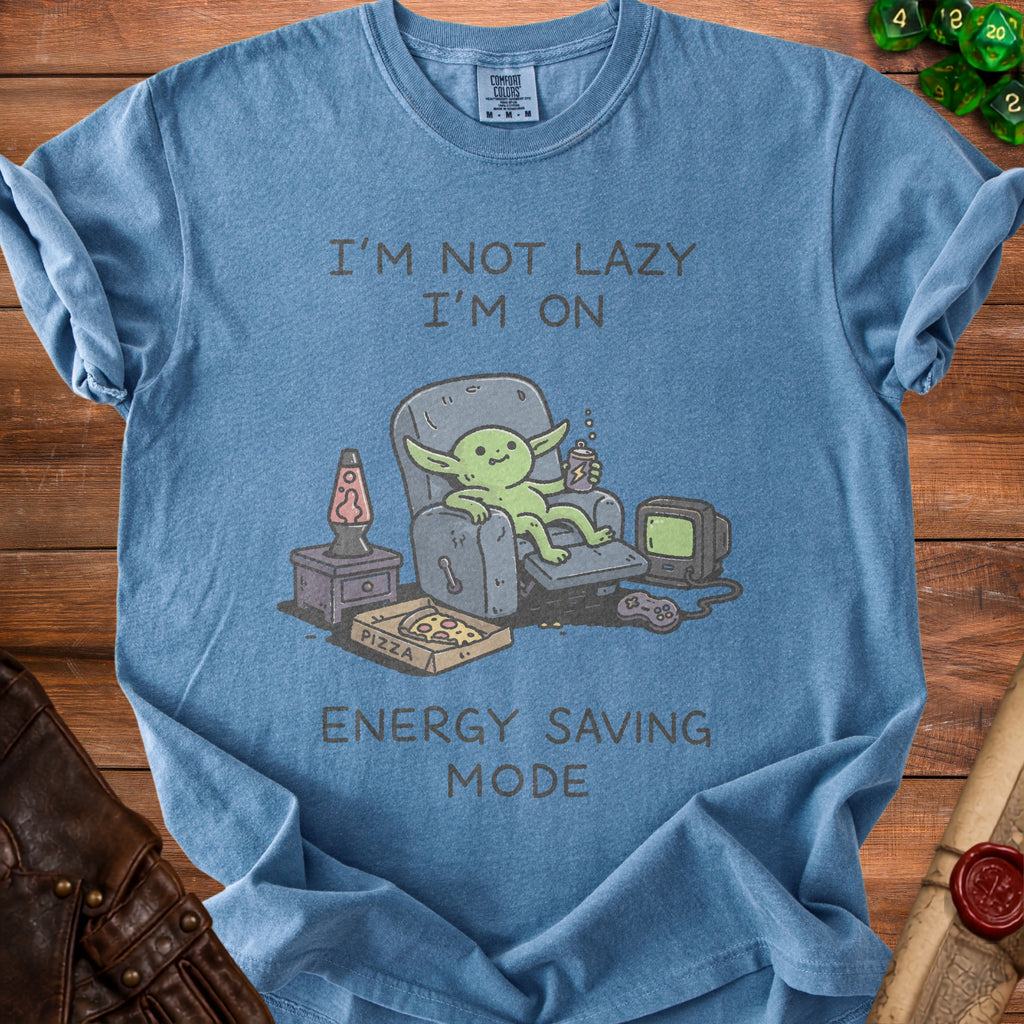 Blue t-shirt with graphic of creature in recliner saying "I'm Not Lazy I'm On Energy Saving Mode".