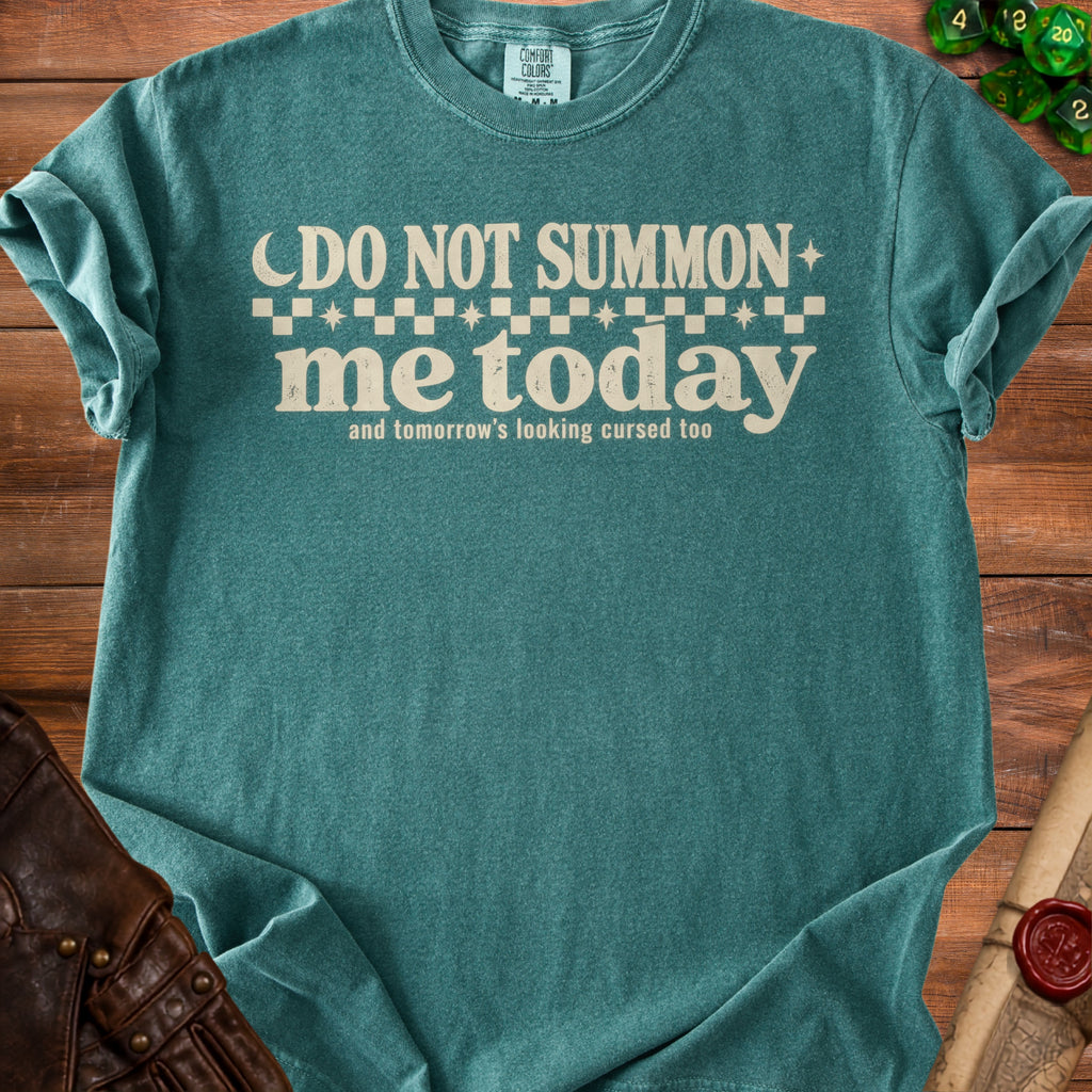 Teal t-shirt with "DO NOT SUMMON me today and tomorrow's looking cursed too" text.
