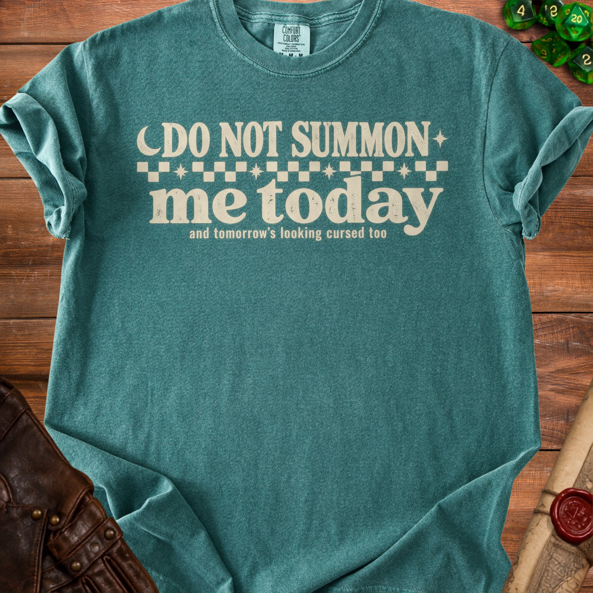 Teal t-shirt with "DO NOT SUMMON me today and tomorrow's looking cursed too" text.