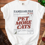 White t-shirt with "Familiar File" and "Pet More Cats" in red and gray text.