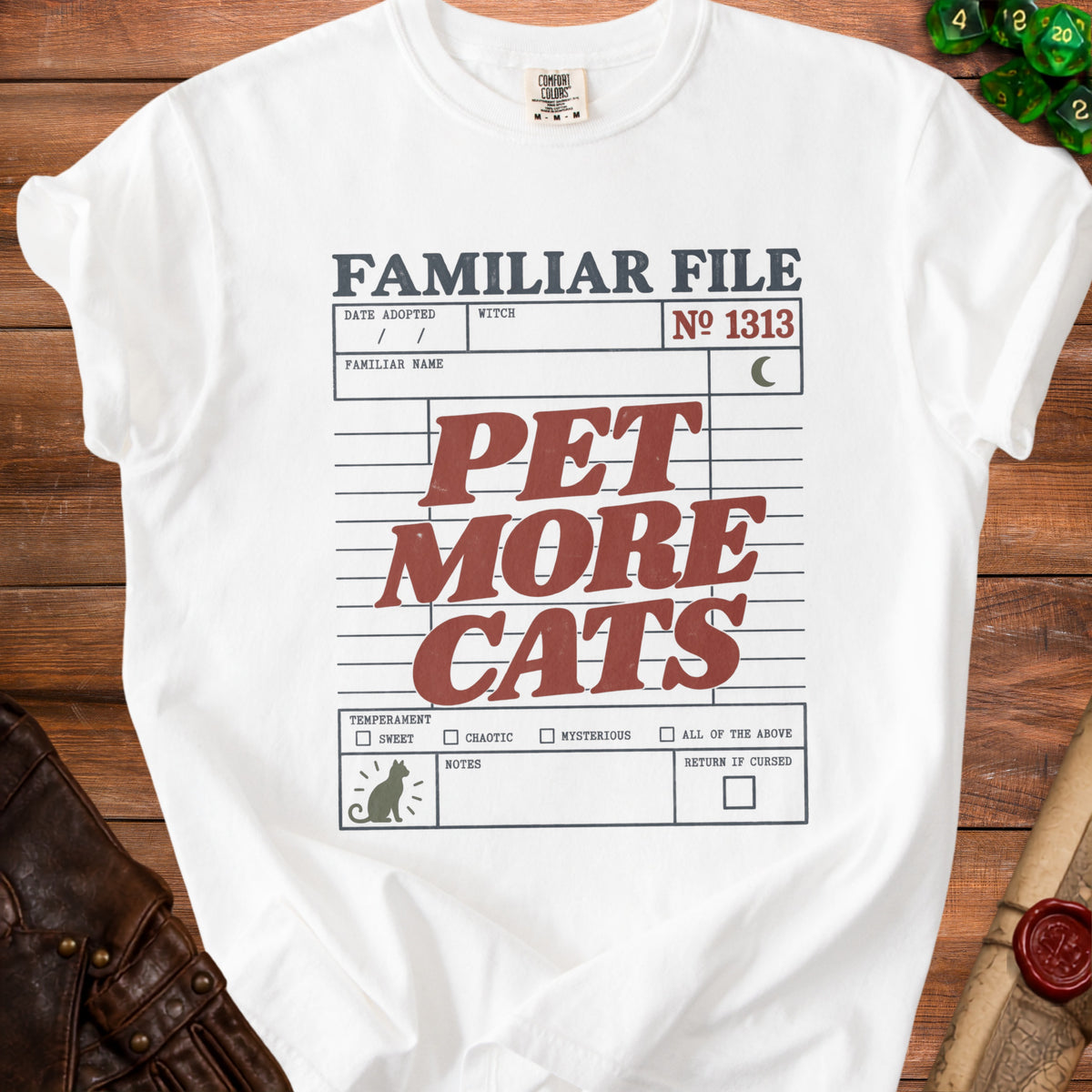 White t-shirt with "Familiar File" and "Pet More Cats" in red and gray text.