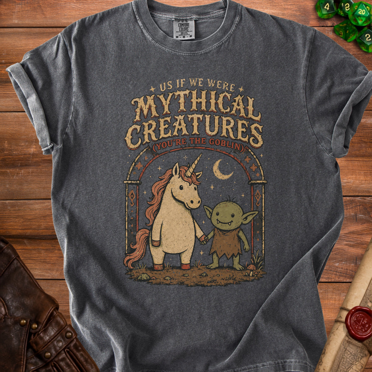 Charcoal t-shirt with unicorn and goblin graphic, reading "Us If We Were Mythical Creatures (You're The Goblin)".