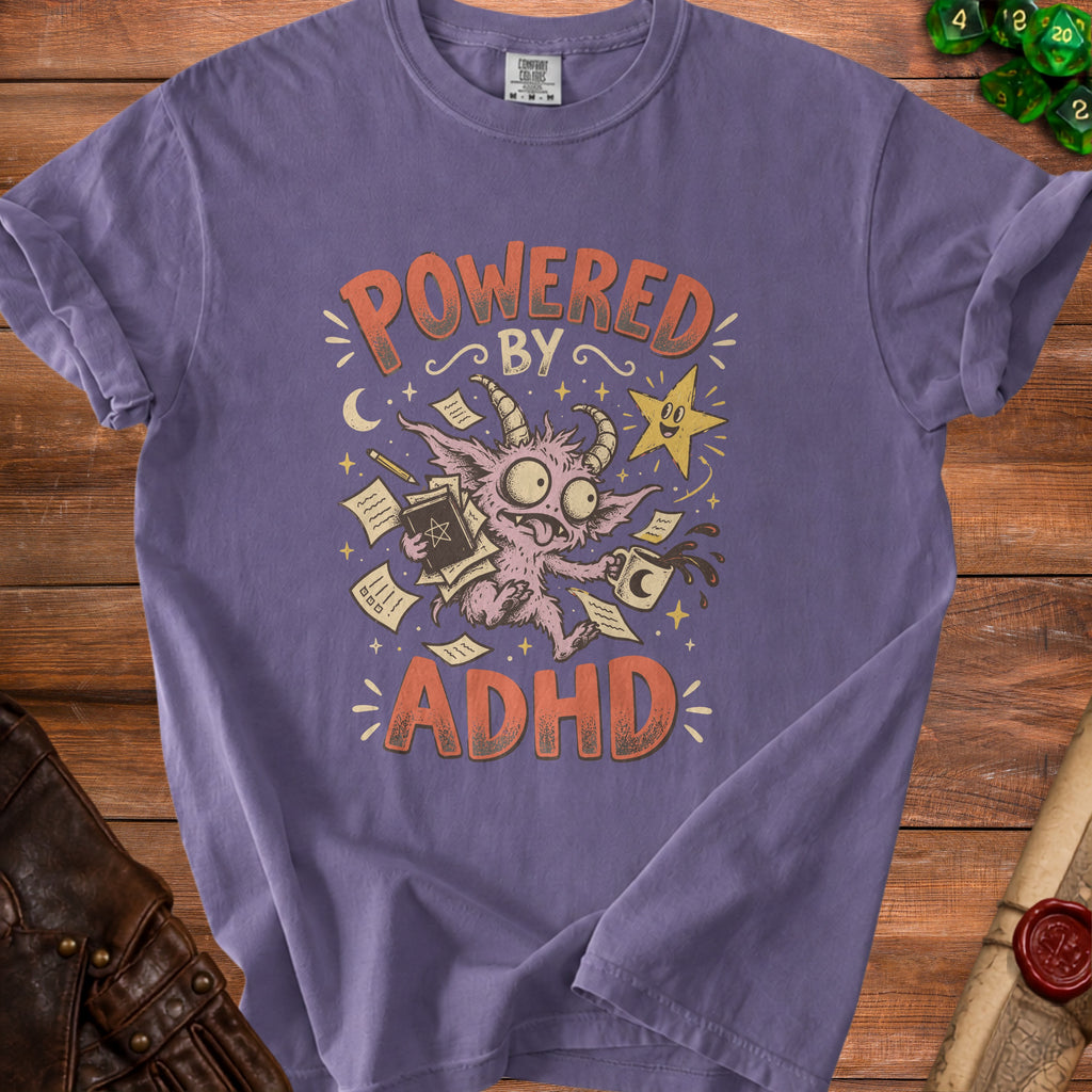 Purple t-shirt with "Powered by ADHD" text and cartoon monster.